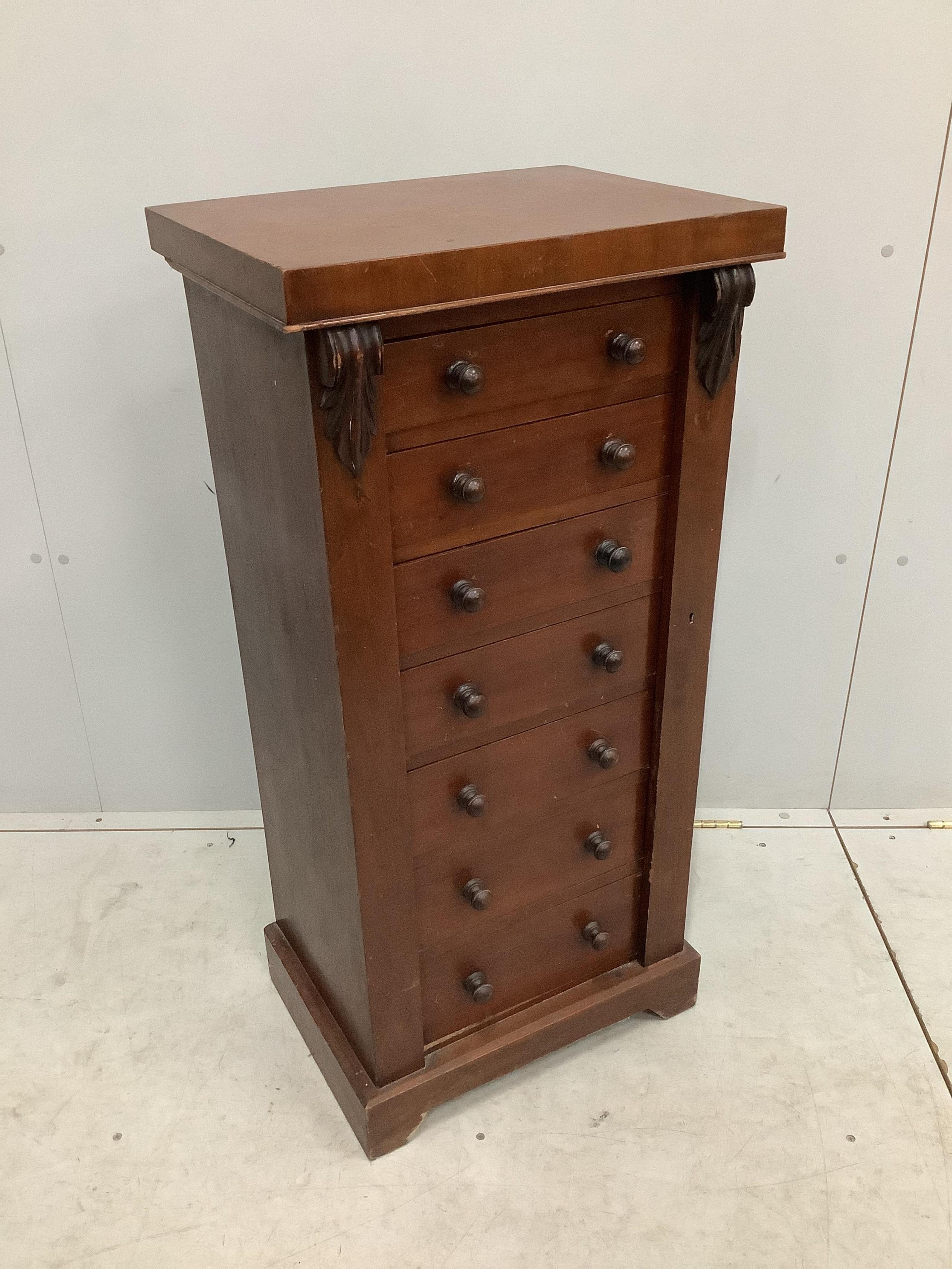 A Victorian mahogany Wellington chest, width 49cm, depth 36cm, height 102cm. Condition - fair